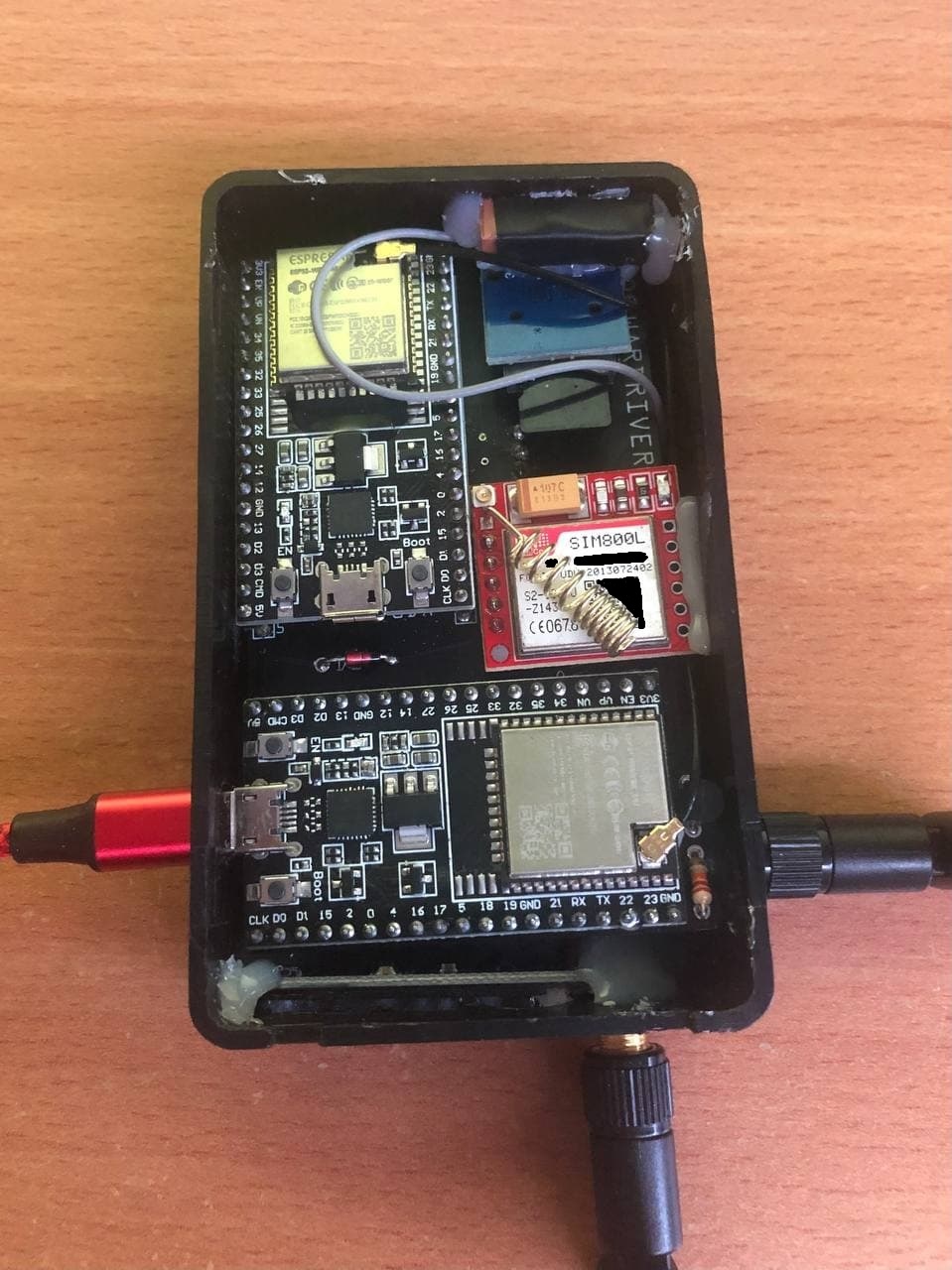 A fully assembled Wardriver Rev3 inside enclosure A fully assembled Wardriver Rev3 inside enclosure